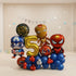 birthday balloon decoration set featuring Marvel characters, including Captain America, Iron Man, Spider-Man, and a large gold number 5 balloon, arranged with blue, red, and gold balloons in a retail store setting.
