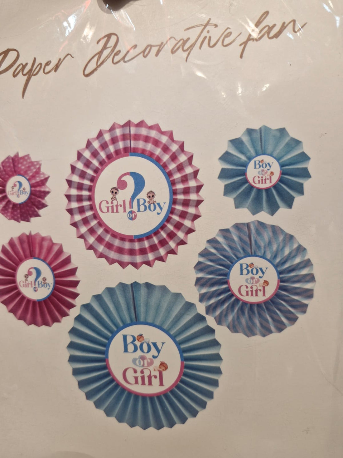 paper decorative fan set in pink and blue colors, displayed for baby shower decoration